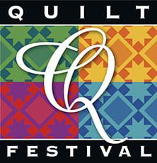 A quilt festival logo with the word " q " in front of it.