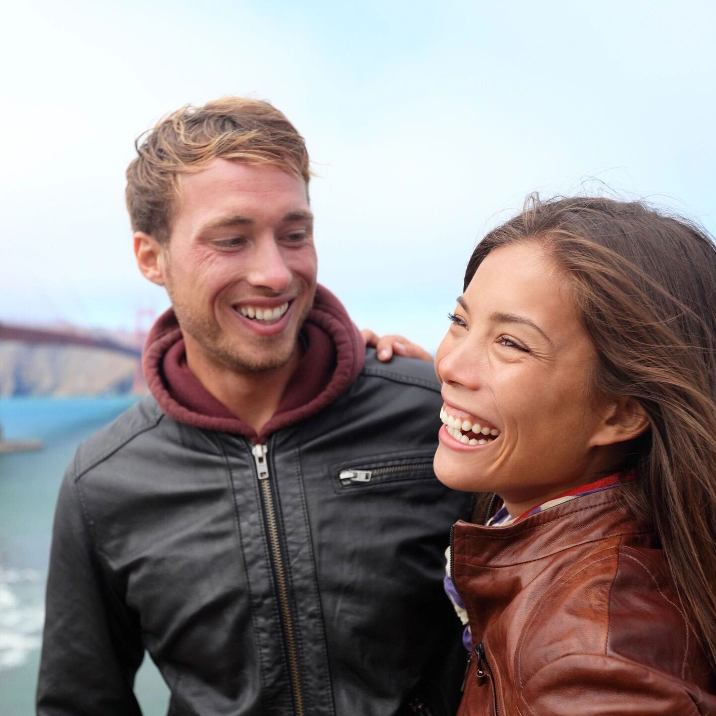 A man and woman smiling for the camera.